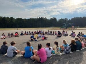 A group of students meeting during the Elizabeth Scott Elementary School run club