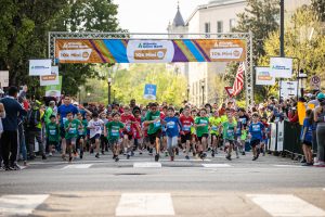 A group of youth runners start the Atlantic Union Bank 10k Mini