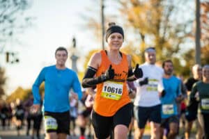 A runner smiles during a race in Richmond, Virginia